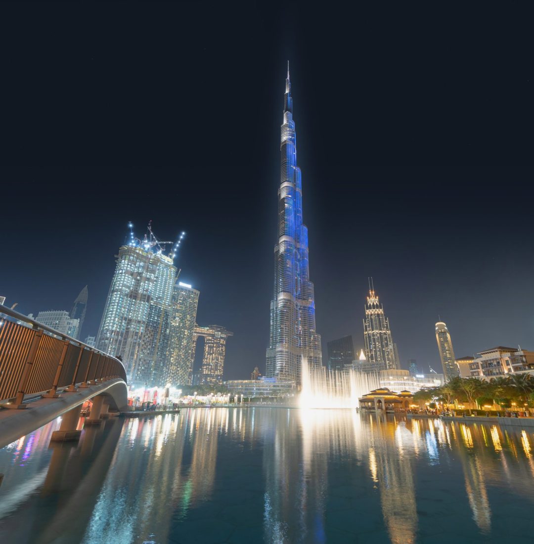 Burj Khalifa in Dubai Downtown skyline and fountain, United Arab Emirates or UAE. Financial district and business area in smart urban city. Skyscraper and high-rise buildings at sunset. Burj Khalifa in Dubai Downtown skyline and fountain, United Arab Emirates or UAE. Financial district and business area in smart urban city. Skyscraper and high-rise buildings at sunset.